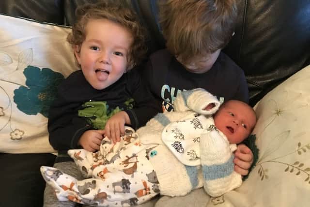 Harrison with his old brother Lennon, four, and five-month-old baby brother McCartney.