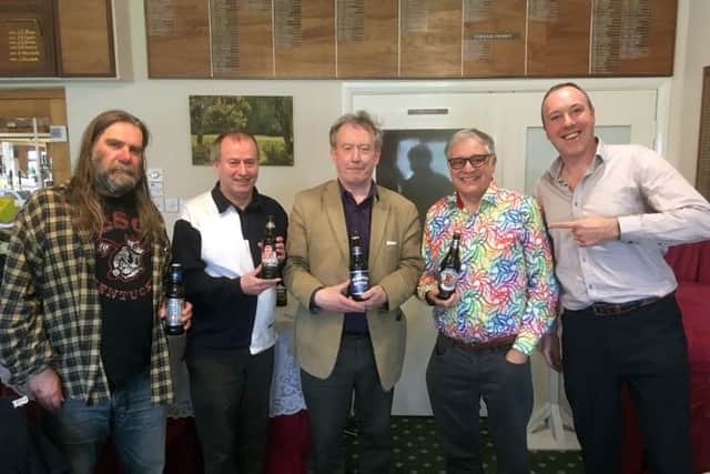 The winning team, from the left, Alan Sharp (York), Gary Morewood (Sheffield), Andrew Hunter (Laceby) and Barry Simmons (West Yorks) with quizmaster Lawrence Cook. EMN-180419-153156001