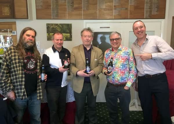 The winning team, from the left, Alan Sharp (York), Gary Morewood (Sheffield), Andrew Hunter (Laceby) and Barry Simmons (West Yorks) with quizmaster Lawrence Cook. EMN-180419-153156001