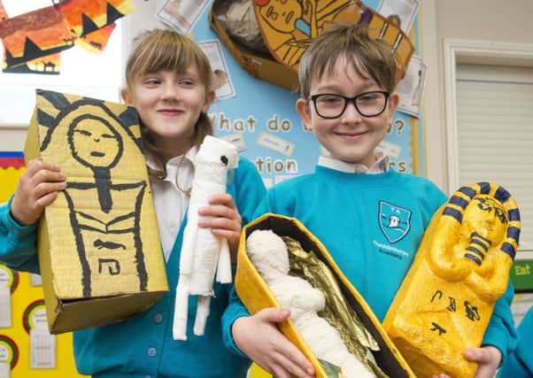 Egyptian project: Year 4 pupil Lottie Hallam ,9, and Year 3 pupil Samuel Venman,8.