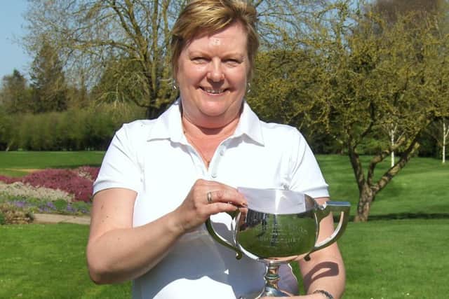 Yvonne Shaffarczyk with the Coney Cup.