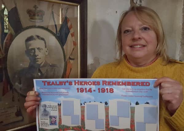 Michelle Baker, Tealby Church Warden with gaps to fill in the display. EMN-180429-223341001