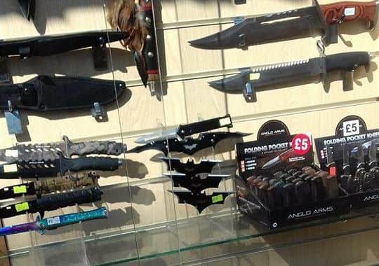 Carl Moore is calling for a ban in the sale of knives-  like these at Eastgate Market. ANL-180423-120113001