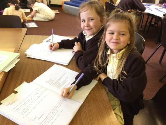Year 3 at the Richmond School, Skegness, during their guided reading activities on St George's Day. ANL-180423-153900001