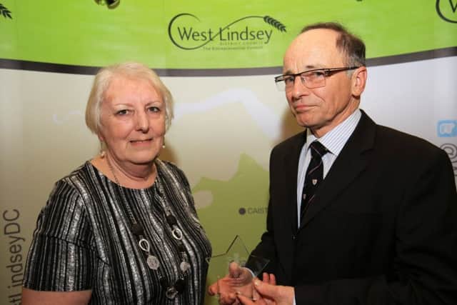 Volunteer of the Year award presented by Coun Sheila Bibb to winner Norman Palmer. EMN-180424-111838001