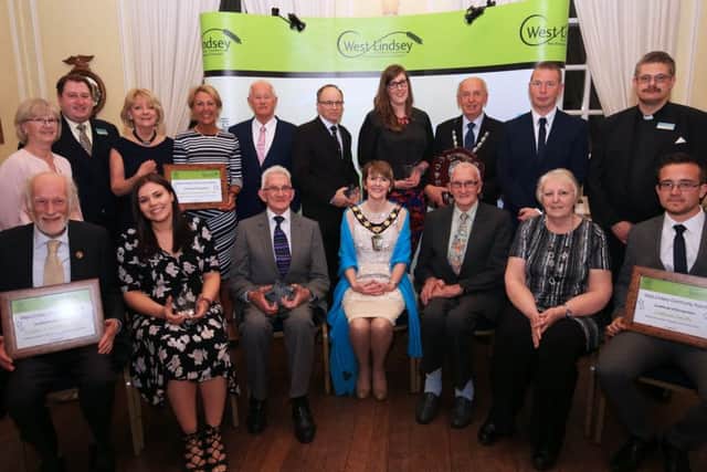 West Lindsey Community Awards winners with the community awards panel EMN-180424-150805001