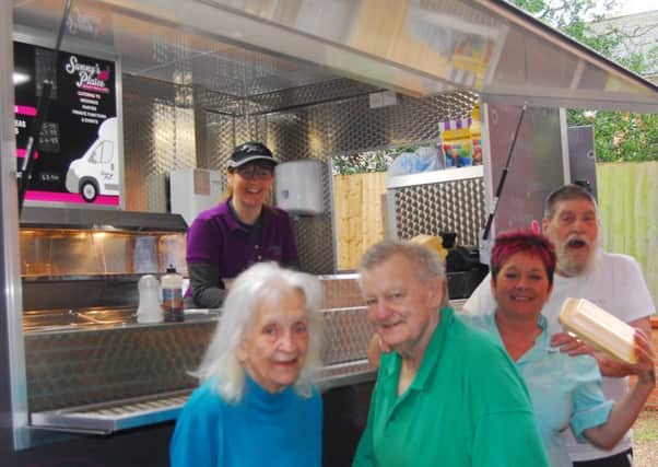 Serving up a nostalgic fishy treat - Sunny's Plaice mobile chip shop at Ashdene care home in Sleaford. EMN-180105-002857001