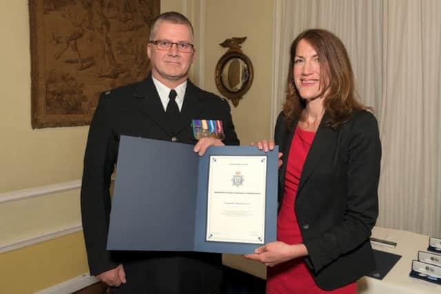 Pc Martin Green with Rachel Watson, Head of Police Workforce and Capability Unit at the Home Office. EMN-180425-174052001