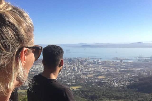 At the end of their exhausting ascent of Table Mountain at over 1,000m. EMN-180105-141407001