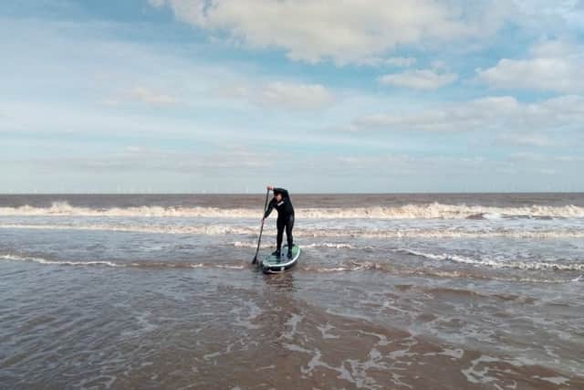 Phil May paddle boarding in Skegness ahread of the East Coast Beach and Watersports Festival May 19-20. ANL-180205-144402001