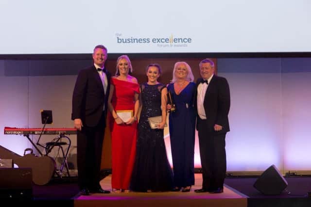 Pictured (l-r) is: Brad Sugars, founder and CEO of ActionCOACH, Tillettss directors Grace Tillett, sister Nancy Tillett and mum Melanie Tillett  with their business coach John McHale.