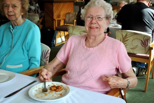 Tucking in: Nancy, a Tanglewood resident, enjoys one of the tasty new meals.