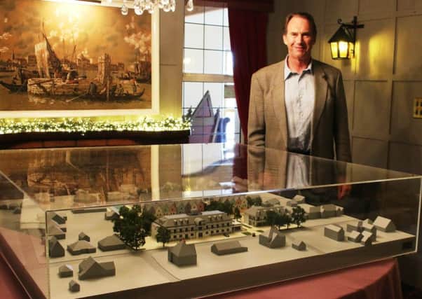 Sandilands hotel owner Tim Cross with the Â£7,000 to-scale model which showcases the proposed plans for the Â£8.5m complex.