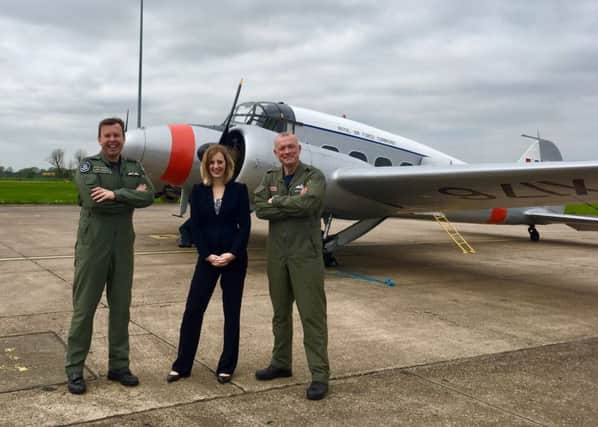 Pictured from left are Station Commander Group Captain Mike Baulkwill, BAE Systems General Manager Alison Ballard and BAE Systems Experimental Test Pilot Peter Kosogorin. EMN-180705-113628001