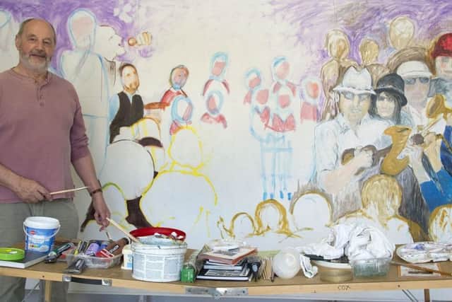 Artist Ian Cox in front of a mural being created during the Sleaford Live Festival at the Carre Gallery Sleaford. Photo: Martin Cameron EMN-180805-114631001