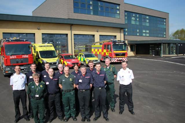 Fire and ambulance personnel at the new shared station on East Road. EMN-180805-174643001