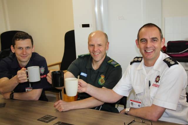 Fire and ambulance personnel at the new shared station on East Road. EMN-180805-174516001