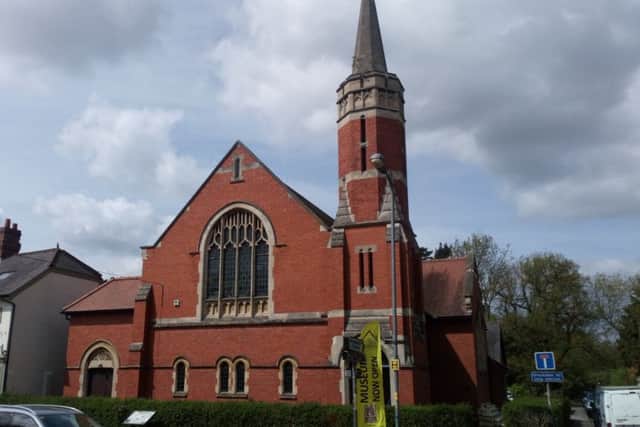 The outside of the church as it looks today. The tower and spire on the right is set to be come a library while the main window will be retained.