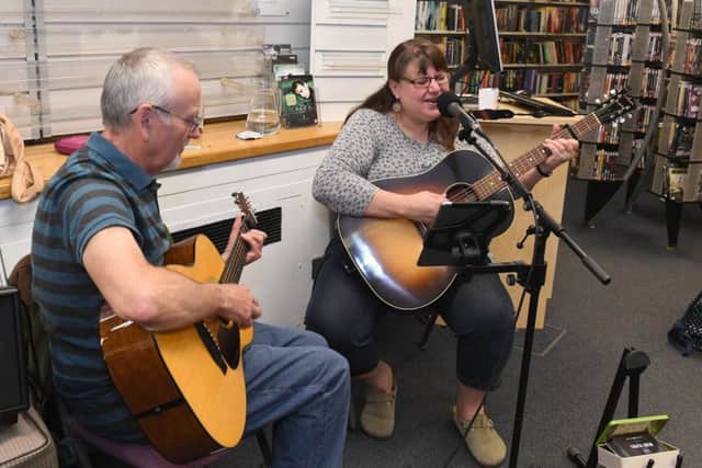 Sleaford Live Festival, Lynn McFarland performing at Sleaford Library. Pictured with Ron Williams. EMN-180514-104927001