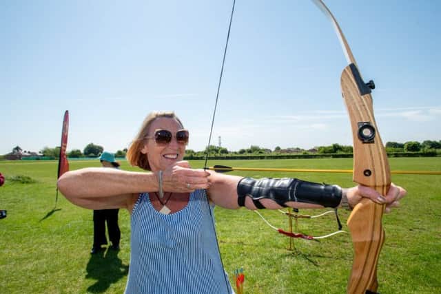 Ruth Few at the WI archery taster session at Sleaford Town Football Club.