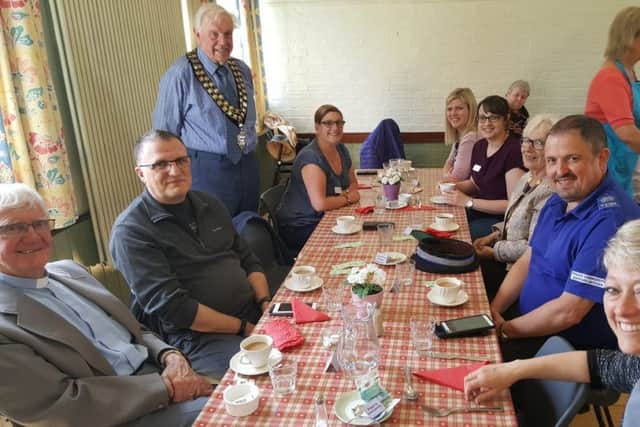 Town mayor Coun Brian Burbidge joins other guests - including PCSO Nigel Wass and the Rev Samantha Parsons - at the relaunch of the Age UK Lindseys Luncheon Club which is held in the Community Centre.