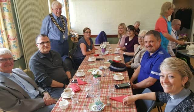 Town mayor Coun Brian Burbidge joins other guests - including PCSO Nigel Wass and the Rev Samantha Parsons - at the relaunch of the Age UK Lindseys Luncheon Club which is held in the Community Centre.