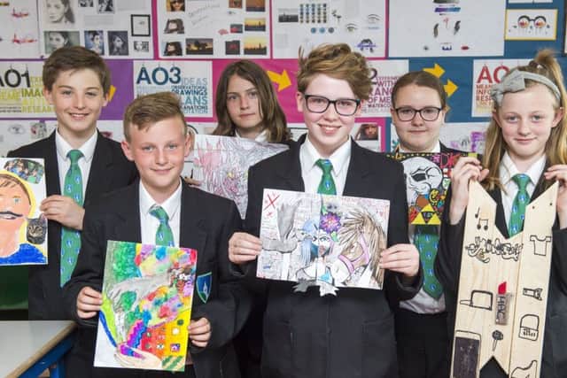 Art competition for Year 7&8 - Who Am I?
Winner Niamh Gillman Year 8 (centre) with runners up (l-r) Jacob Barnard, Henry Page-Nidd, Kacey Dobb, Lily Vines, Lisa Campbell.
