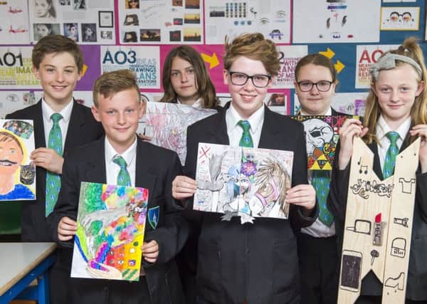 Art competition for Year 7&8 - Who Am I?
 Winner Niamh Gillman Year 8 (centre)  with runners up (l-r) Jacob Barnard, Henry Page-Nidd, Kacey Dobb, Lily Vines, Lisa Campbell.