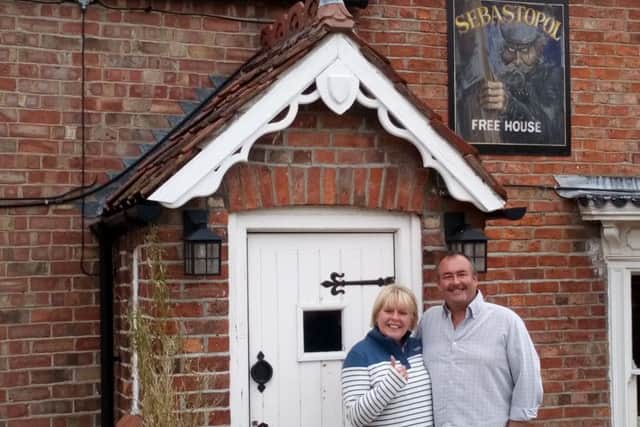 A warm welcome: New owners Steve and Wendy Hughes outside the Sebastolpol Inn which will open tomorrow (Thursday).