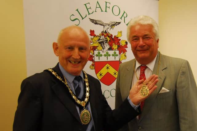 New Mayor of Sleaford Coun Grenville Jackson congratulates his new Deputy Mayor, Coun Adrian Snookes. EMN-180517-095108001