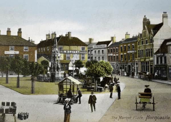 This postcard capturing the Market Place, in Horncastle, will be included in the auction next week. EMN-180517-095729001
