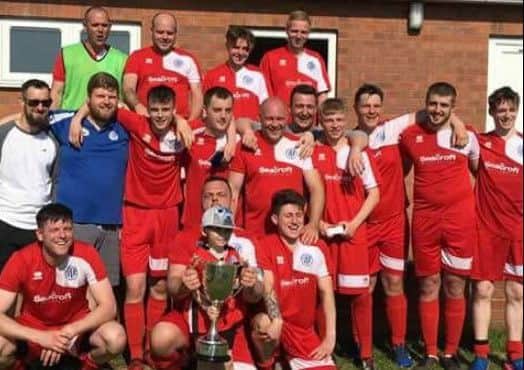 Sutton Rovers lift the Tom Sandys Trophy EMN-180521-101325002