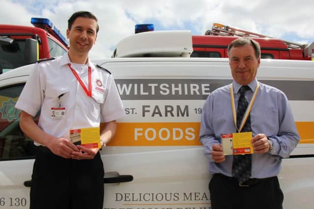 James Baker from Lincolnshire Fire and Rescue with Wiltshire Farm Foods Operations Manager, Paul Dalton. EMN-180518-154611001