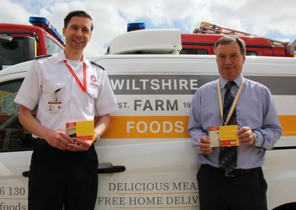 James Baker from Lincolnshire Fire and Rescue with Wiltshire Farm Foods Operations Manager, Paul Dalton. EMN-180518-154611001