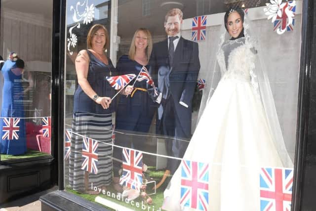 Owners of Love and Lace Bridal shop L-R Sarah Henderson and Jo Nott with their window display. EMN-180521-102528001