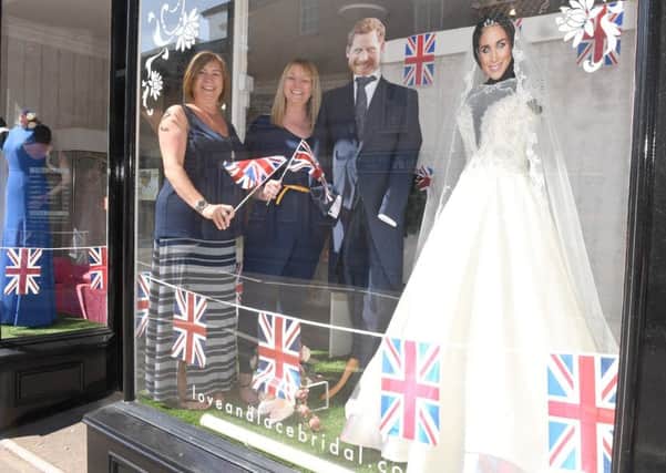 Owners of  Love and Lace  Bridal shop L-R Sarah Henderson and Jo Nott with their window display. EMN-180521-102528001