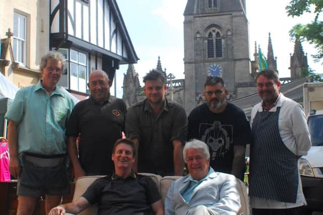 Sleaford market traders with Coun Adrian Snookes sat front right and Nigel Gresham behind. EMN-180522-120347001