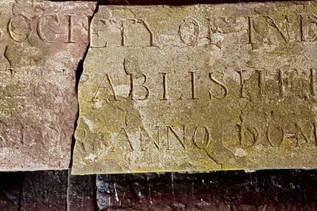 Part of the Caistor Workhouse foundation stone EMN-180521-174208001