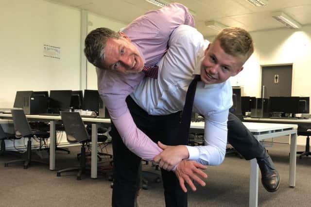 Sam tries out a throw on Lincoln UTC vice-principal Stuart Hamer EMN-180525-165247002
