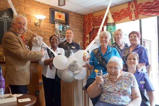Town mayor Coun Brian Burbidge (left) at one of the many events he has attended in the last 12 months - this time at the Tanglewood Care Home in Horncastle
