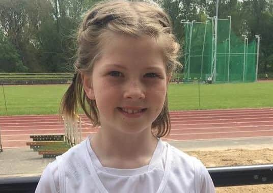 Marla Bell won three medals and two PBs in the U11 girls category EMN-180525-112220002