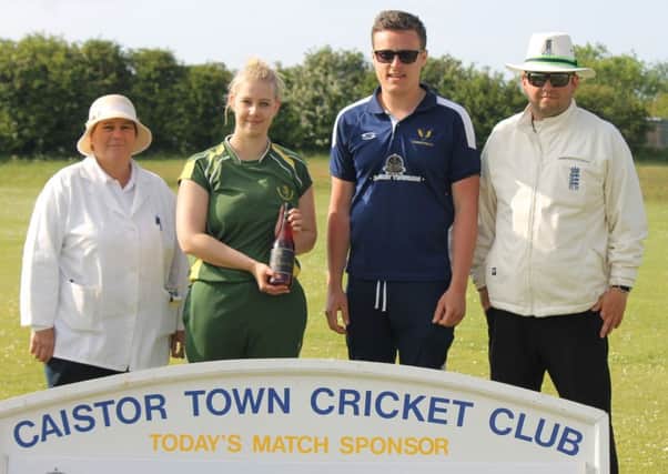 Amy Sims receives the player of the match award from Caistor CC captain Kieran Brooker for her star turn against Cambridgeshire. Photo: Wes Allison EMN-180529-122138002