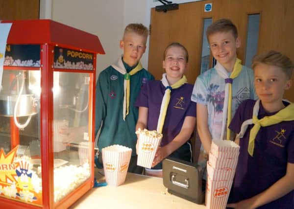 Grasby Scouts helped create the cinema feel by selling popcorn EMN-180528-053058001