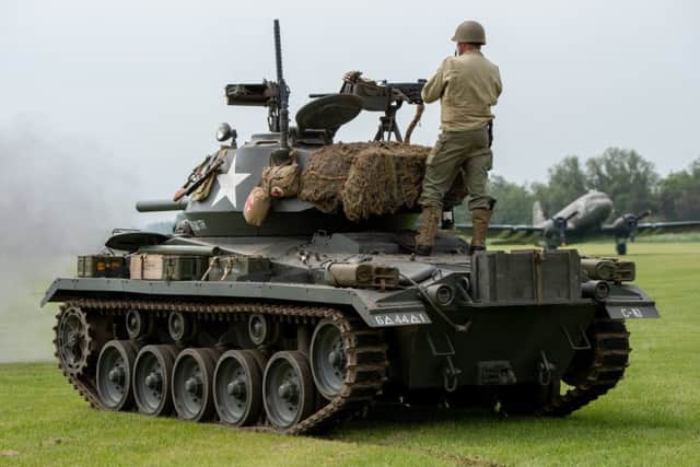 Real firing tanks wowed spectators at the Lanc, Tank and Military Machines event. EMN-180528-112428001