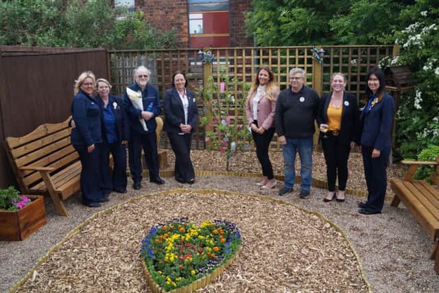 The hardworking staff who made the garden possible EMN-180106-070439001