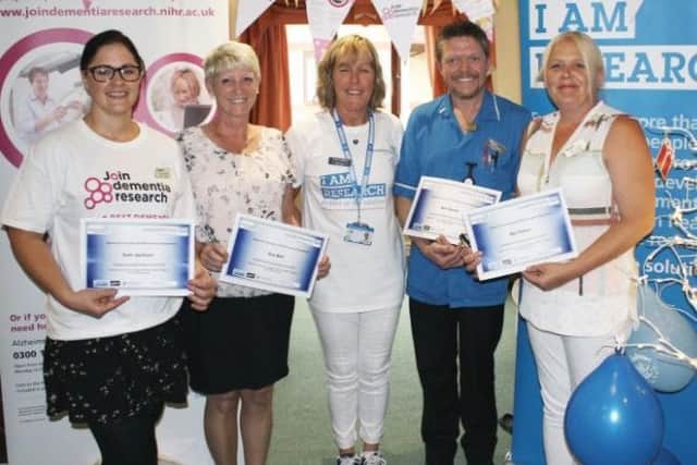 From left Sam Jackson (Cedar Falls, Spalding), Sue Bell (Tanglewood, Horncastle), Tracey Collishaw (LPFT), Karl Smith (Toray Pines, Coningsby) and Mel Hinton (Sandpiper, Alford). Fellow certificate holder Lauren Sharman is not pictured. EMN-180106-110435001