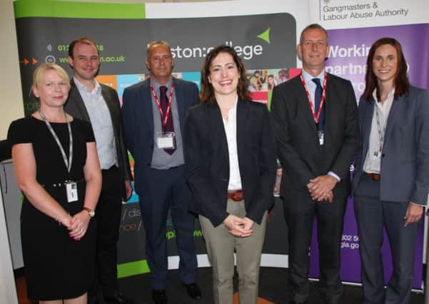 Pictured, from left, are: Kaley Boothby, Boston College; Matt Warman, Boston and Skegness MP; Frank Hanson, GLAA Policy Officer; Victoria Atkins, Minister for Crime, Safeguarding, Vulnerability and Women; Mark Heath, GLAA Deputy Director of Business Change; Jo Maher, Boston College Principal