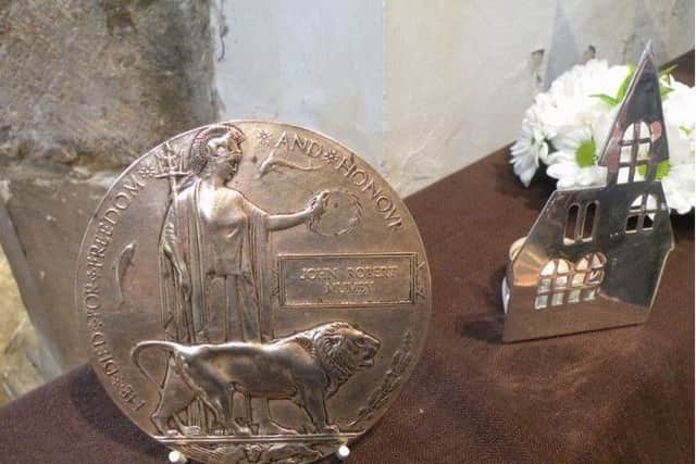 Great excitement was caused when one descendant arrived at the Church with the Death Plaque (Dead Man's Penny) of John Mumby. EMN-180106-173225001
