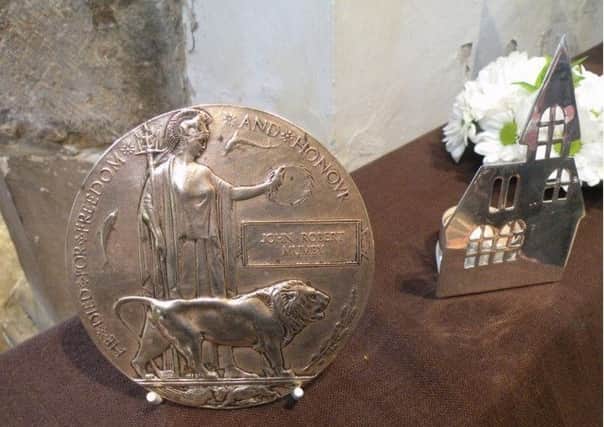 Great excitement was caused when one descendant arrived at the Church with the Death Plaque (Dead Man's Penny) of John Mumby. EMN-180106-173225001