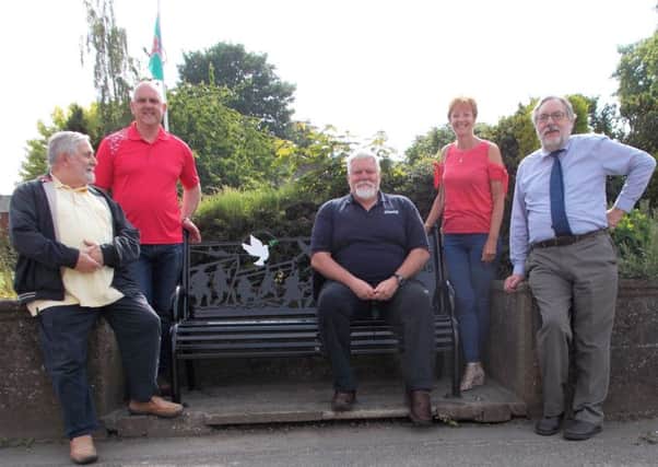 Bardney Councillors Charles Shaw, Malcolm Speed, Sally Zubic, John Zubic and Vice Chairman Robin Darby with one of the benches EMN-180406-180234001